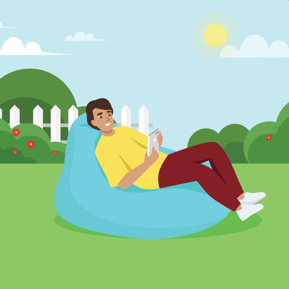 Young man sits on bean bag with gadget. Work and chill. Modern flat vector illustration