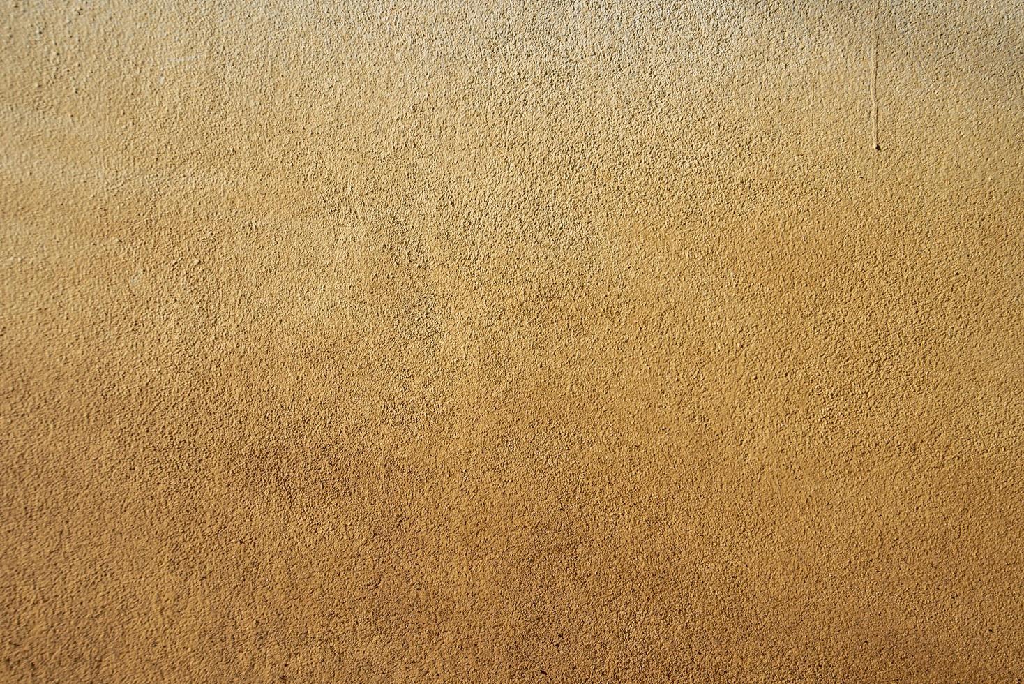 old yellow or orange wall Background textures are great for adding text or graphics. photo