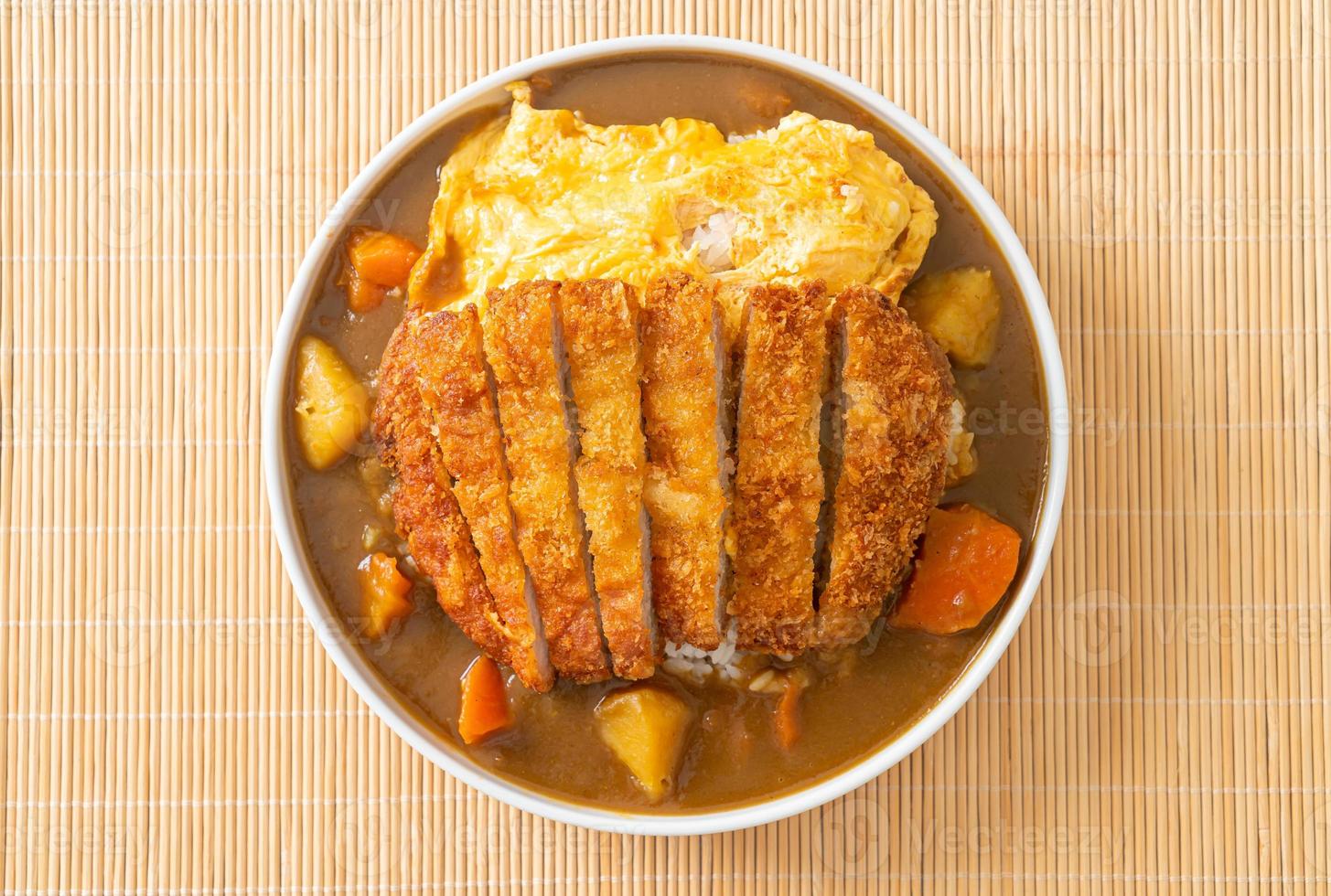 curry rice with fried pork cutlet and creamy omelet photo