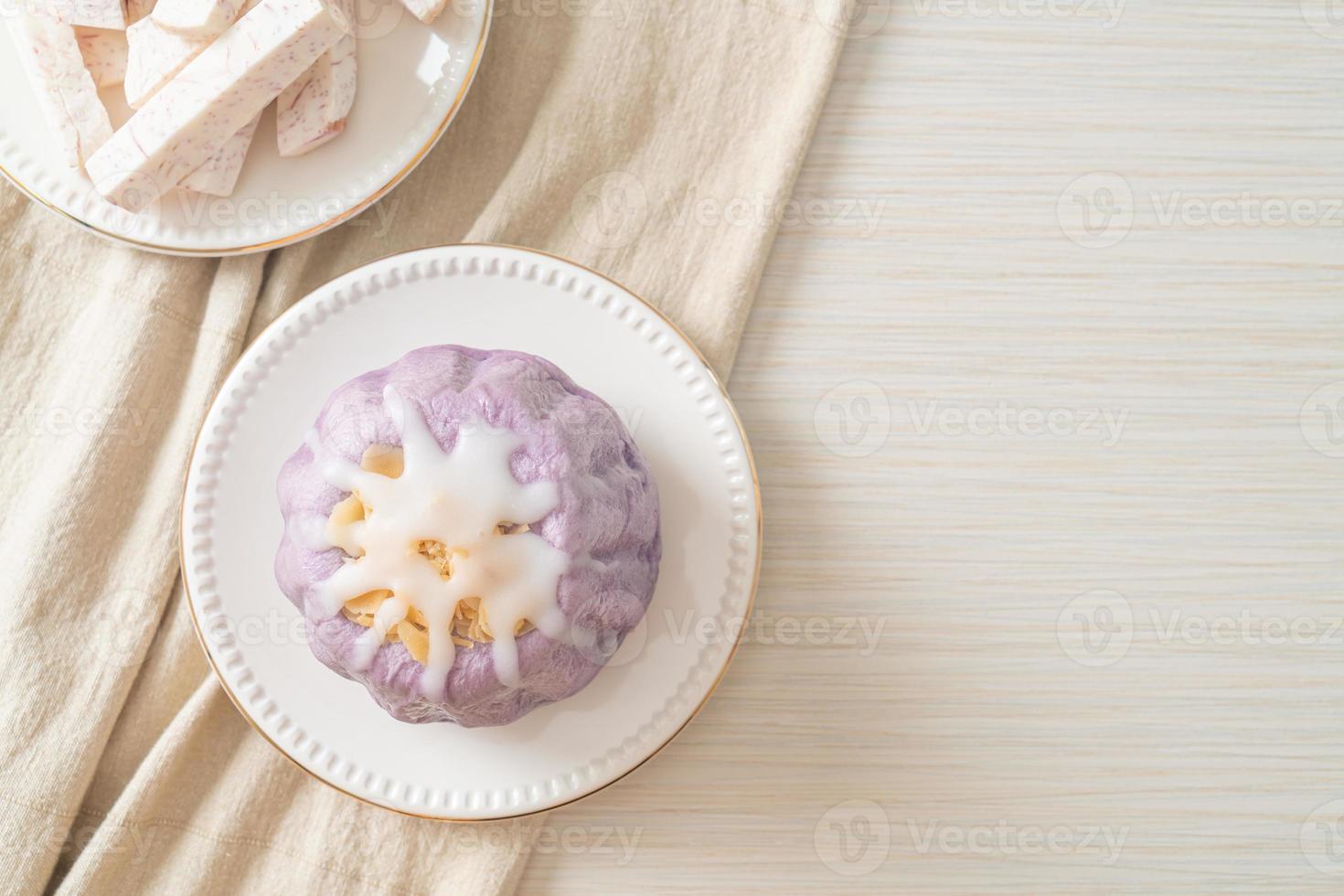 taro bun with white sugar cream and nut photo