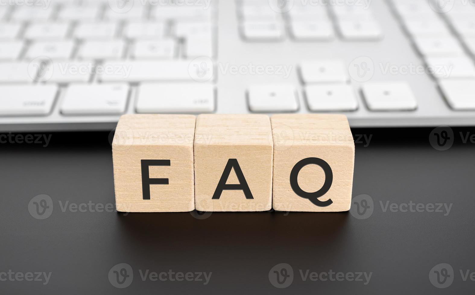 FAQ or frequently asked questions on wooden block photo