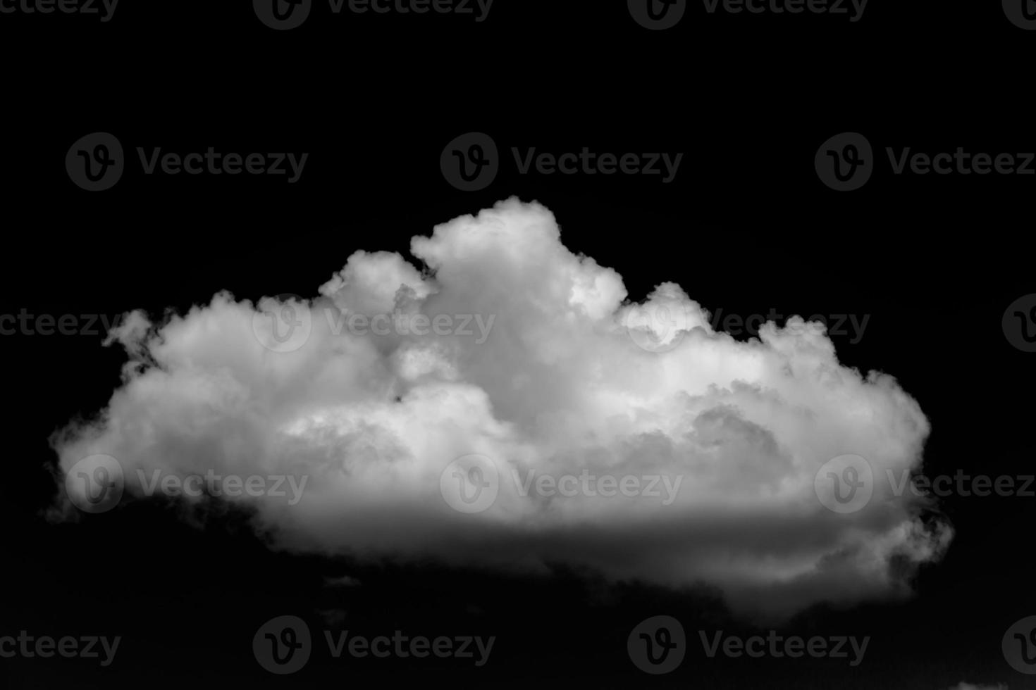 Separate white clouds on a black background have real clouds. photo