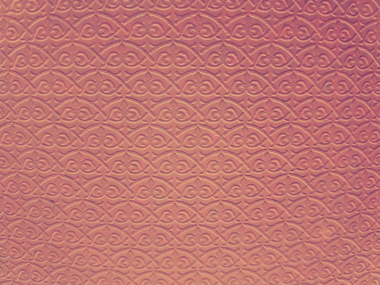 Artificial image of orange patterned texture for background work. photo