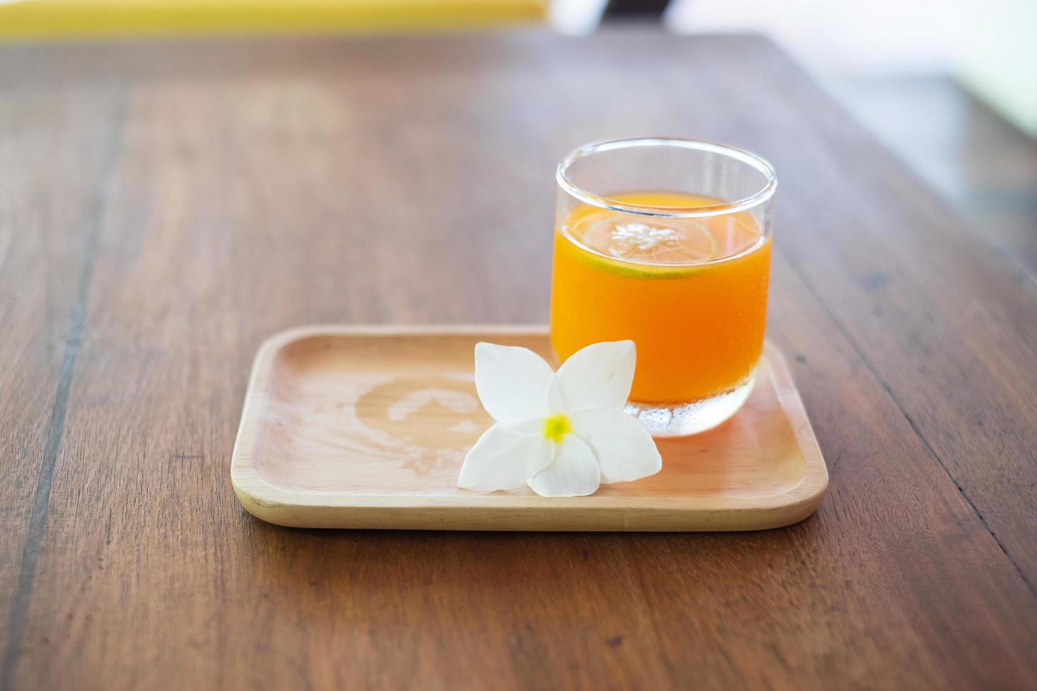 Fresh ice Orange juice in the luxury hotel, welcome drink for guests photo