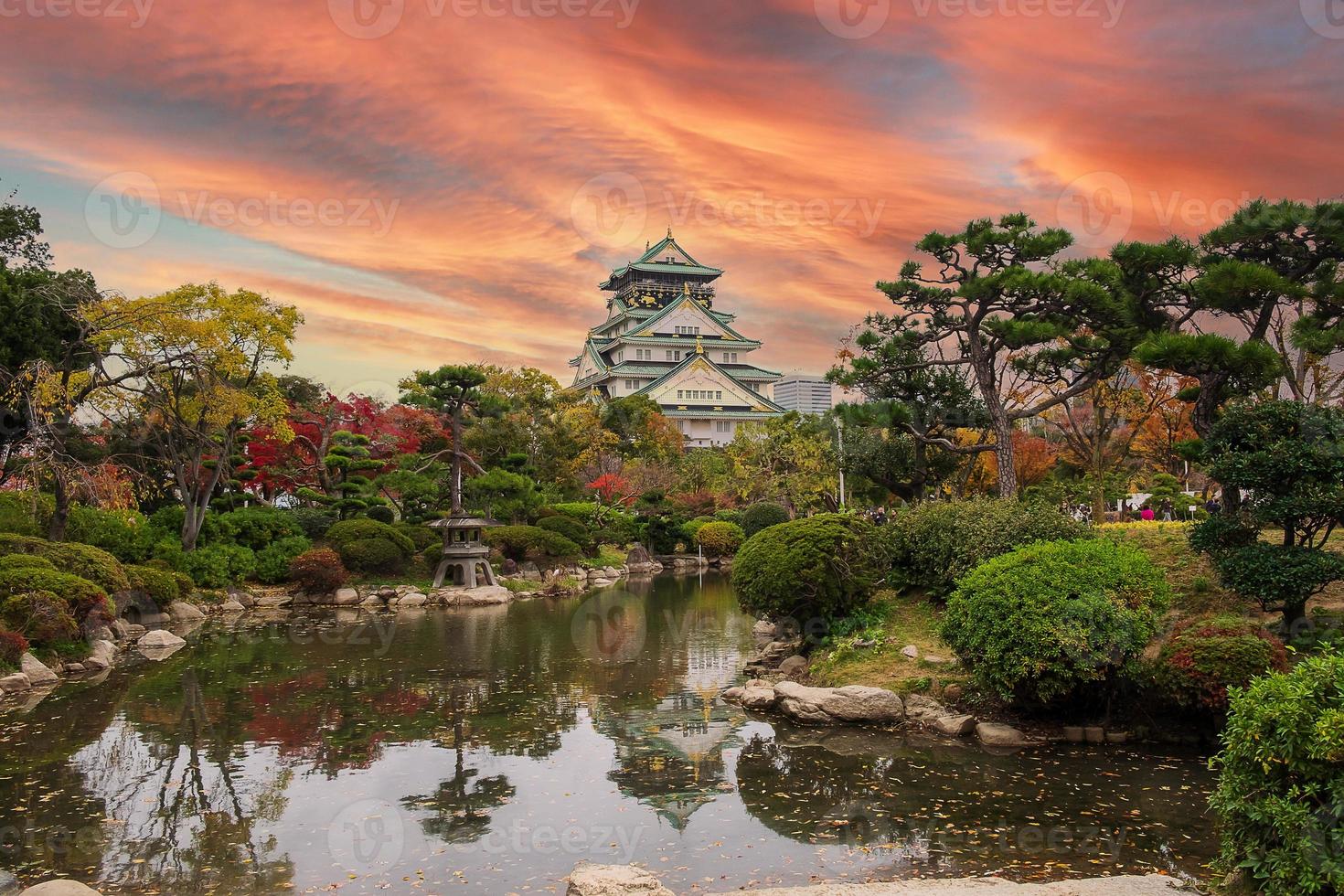 Osaka castle in Autumn foliage season, is a famous Japanese castle, landmark and popular for tourist attractions in Osaka, Kansai, Japan photo