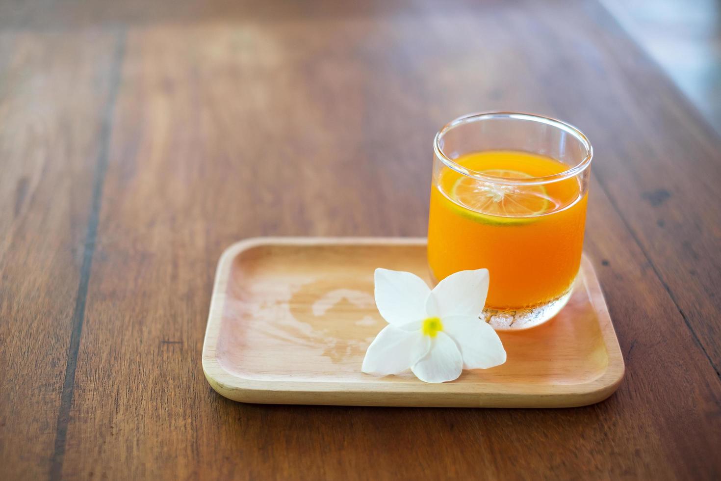 Fresh ice Orange juice in the luxury hotel, welcome drink for guests photo