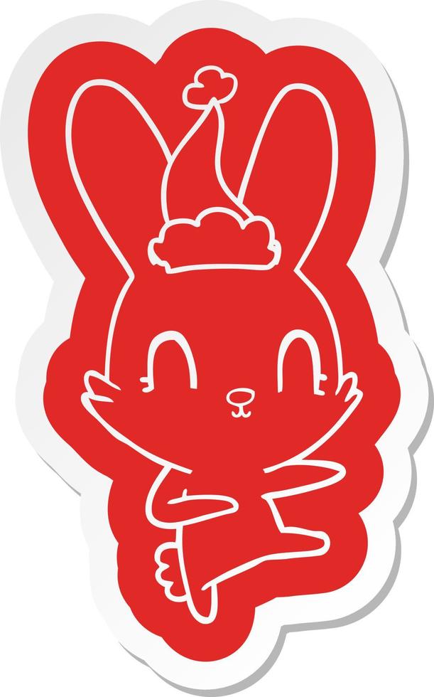 cute cartoon  sticker of a rabbit dancing wearing santa hat vector
