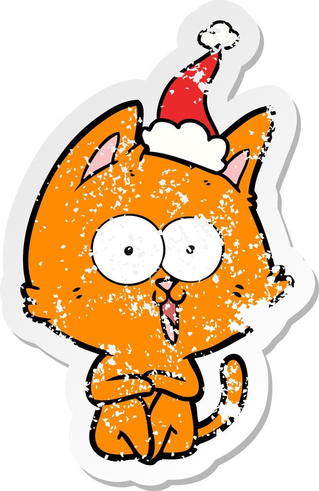 funny distressed sticker cartoon of a cat wearing santa hat vector