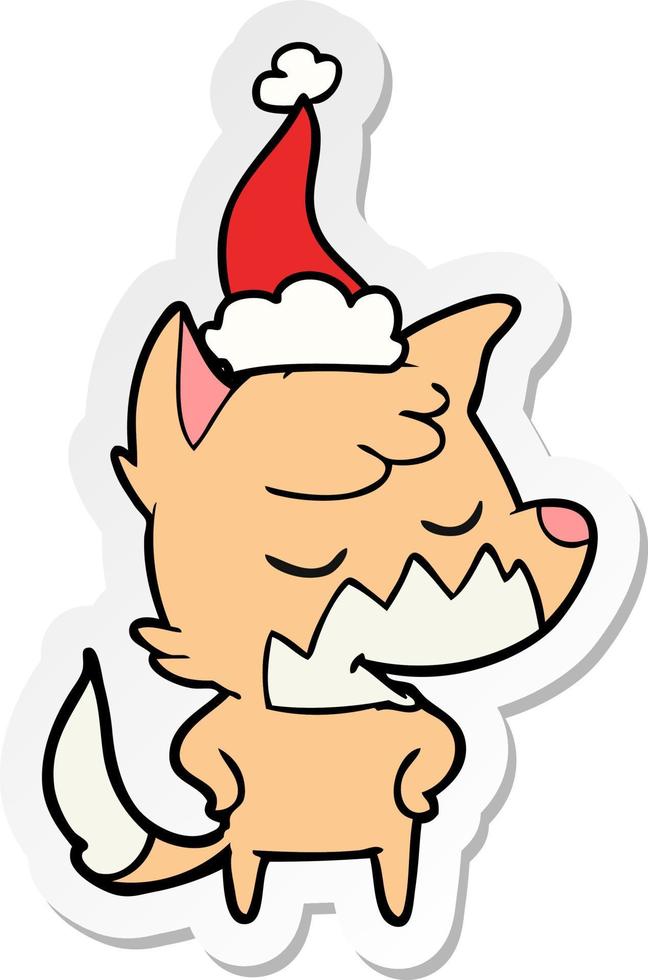 friendly sticker cartoon of a fox wearing santa hat vector