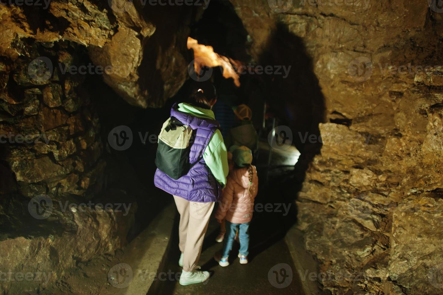 Family explores at Punkva Caves, Czech Republic. photo