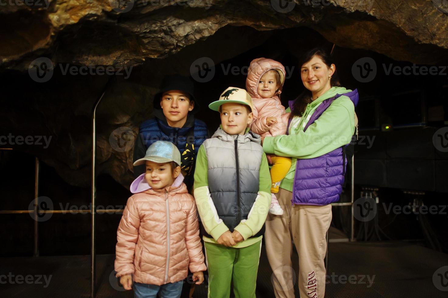 Family explores at Punkva Caves, Czech Republic. photo