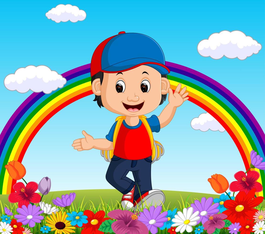 chico lindo en un jardín de flores con arco iris vector