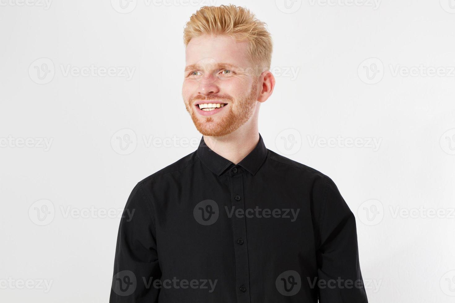 Closeup of happy smiling red hair guy isolated on white background photo