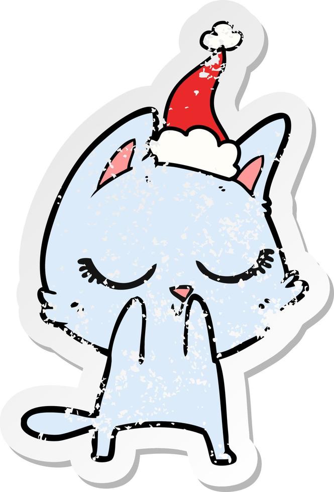 calm distressed sticker cartoon of a cat wearing santa hat vector