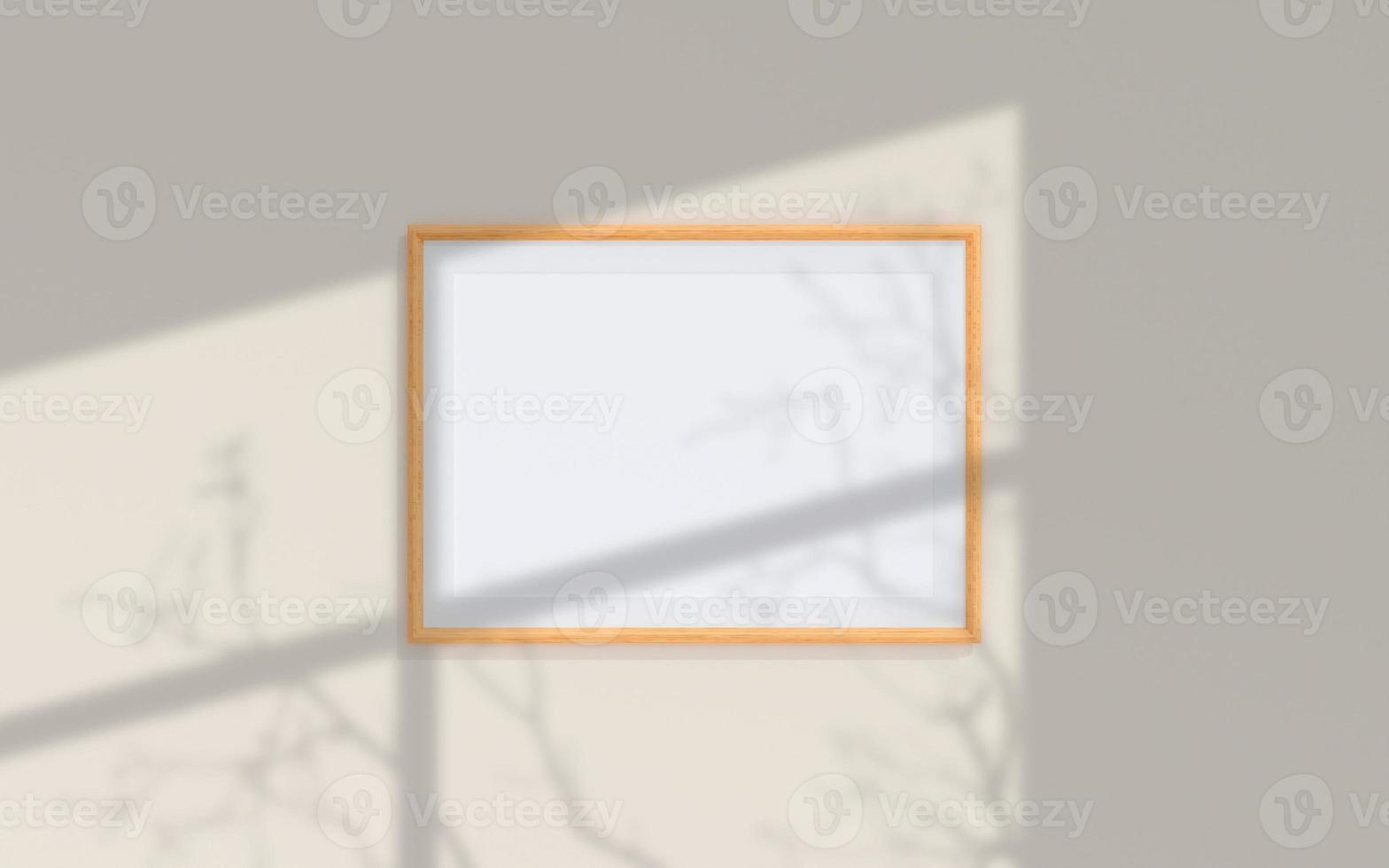 Clean and minimalist front view landscape wooden photo or poster frame mockup hanging on the wall with shadow overlay. 3d rendering.
