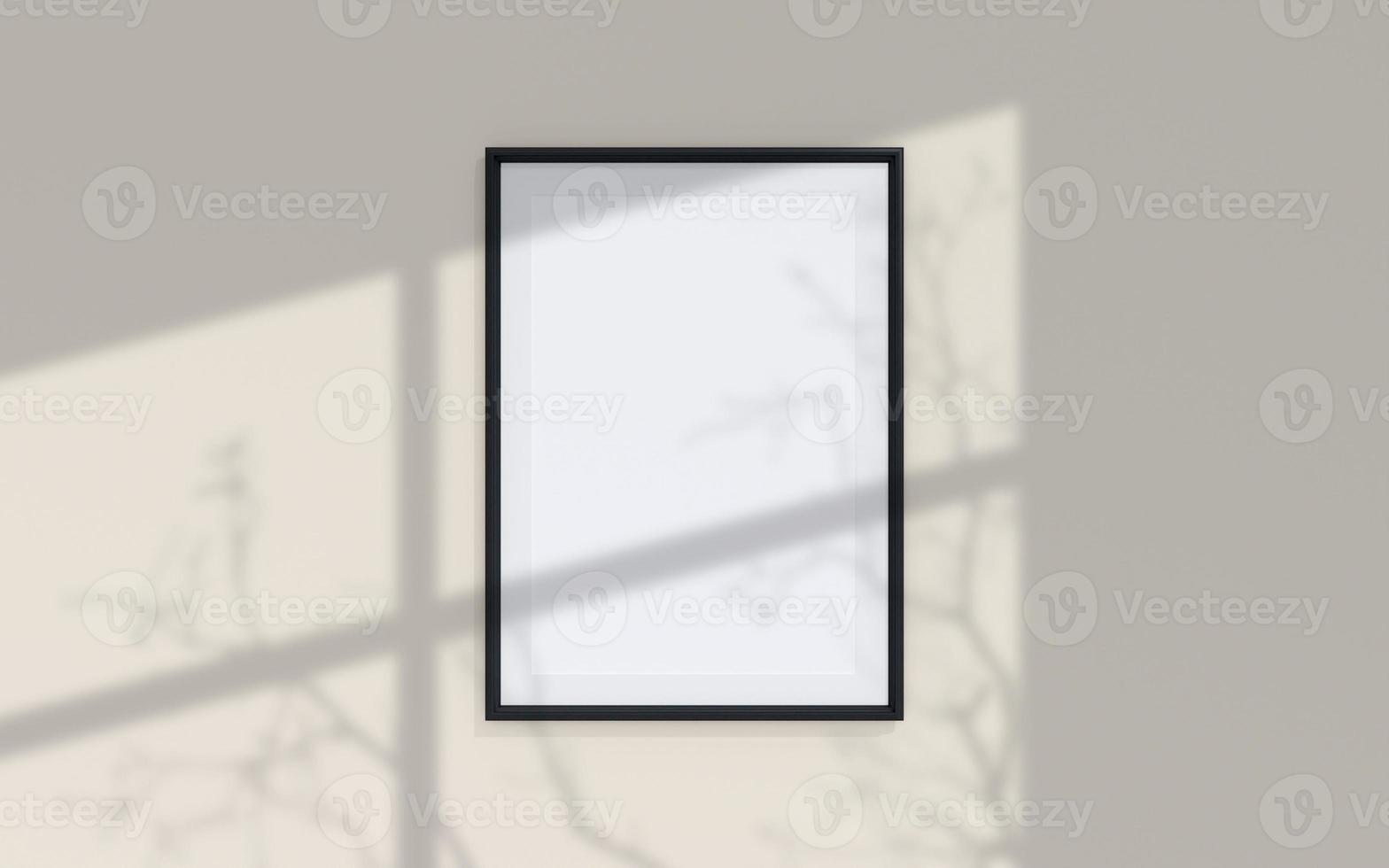 Clean and minimalist front view portrait black photo or poster frame mockup hanging on the wall with shadow overlay. 3d rendering.