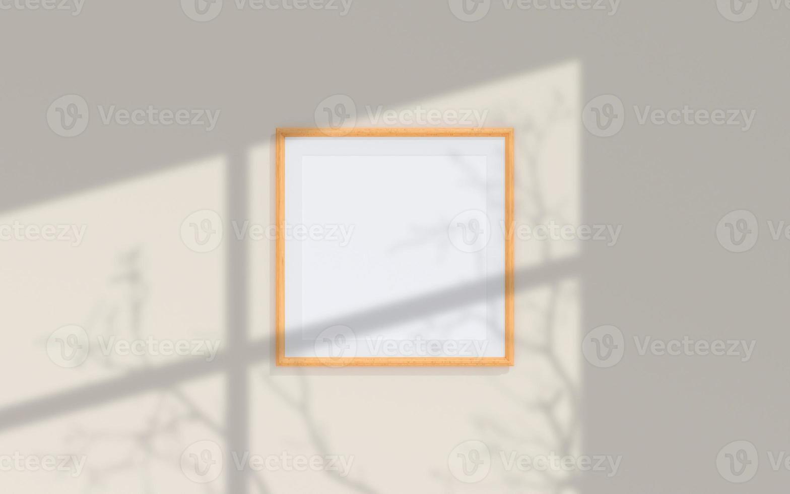 Clean and minimalist front view square wooden photo or poster frame mockup hanging on the wall with shadow overlay. 3d rendering.