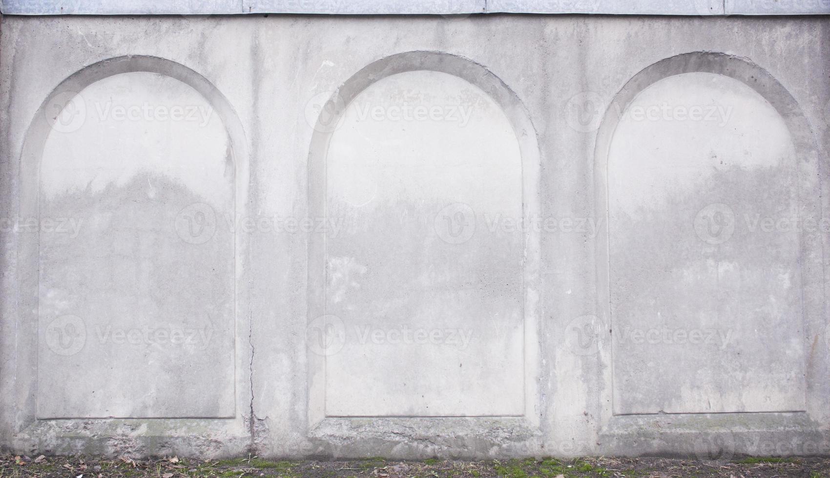 simple architecture of modern building pattern. concrete wall with arche shape photo