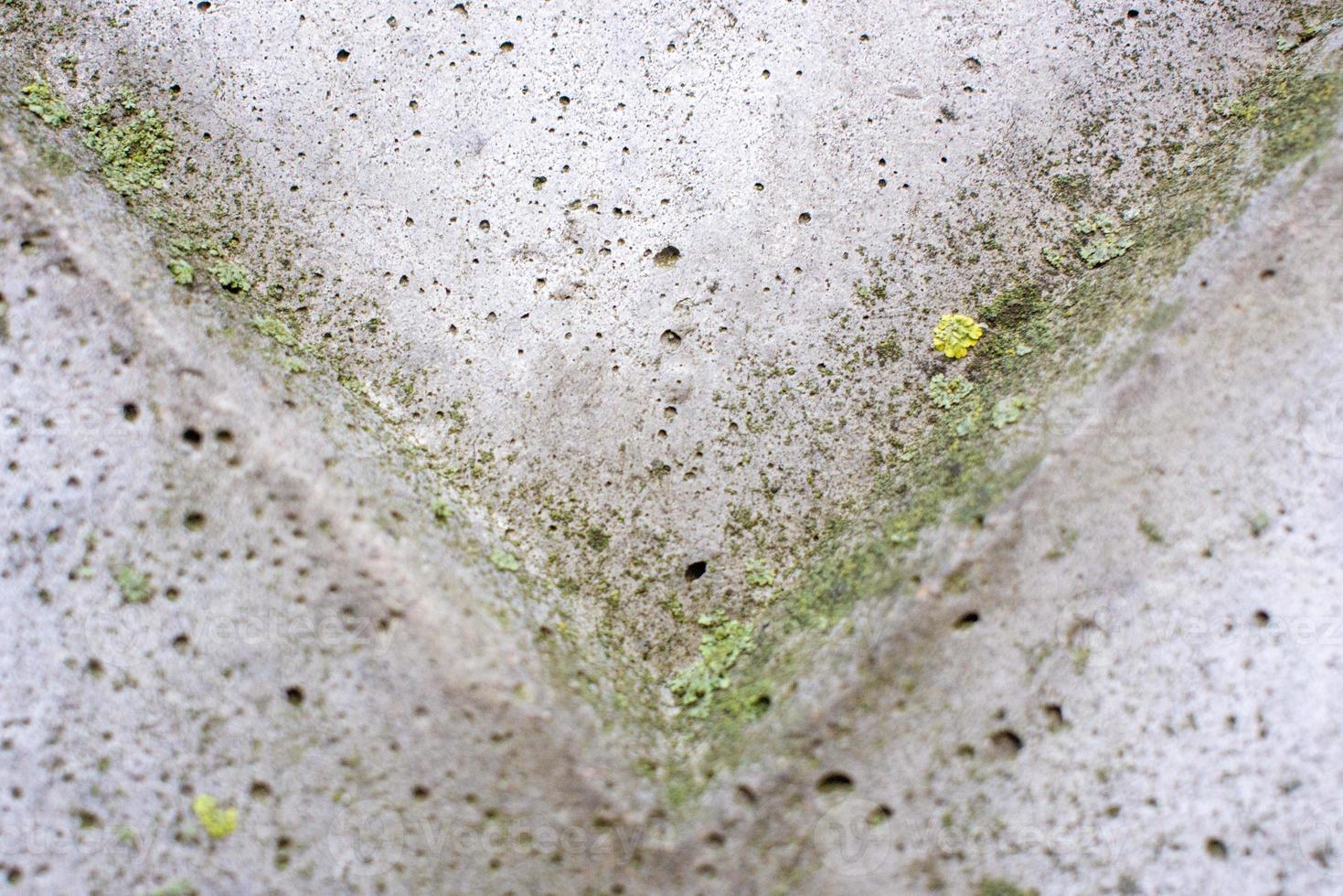 angle down Background. Abstract geometric background of the concrete. photo