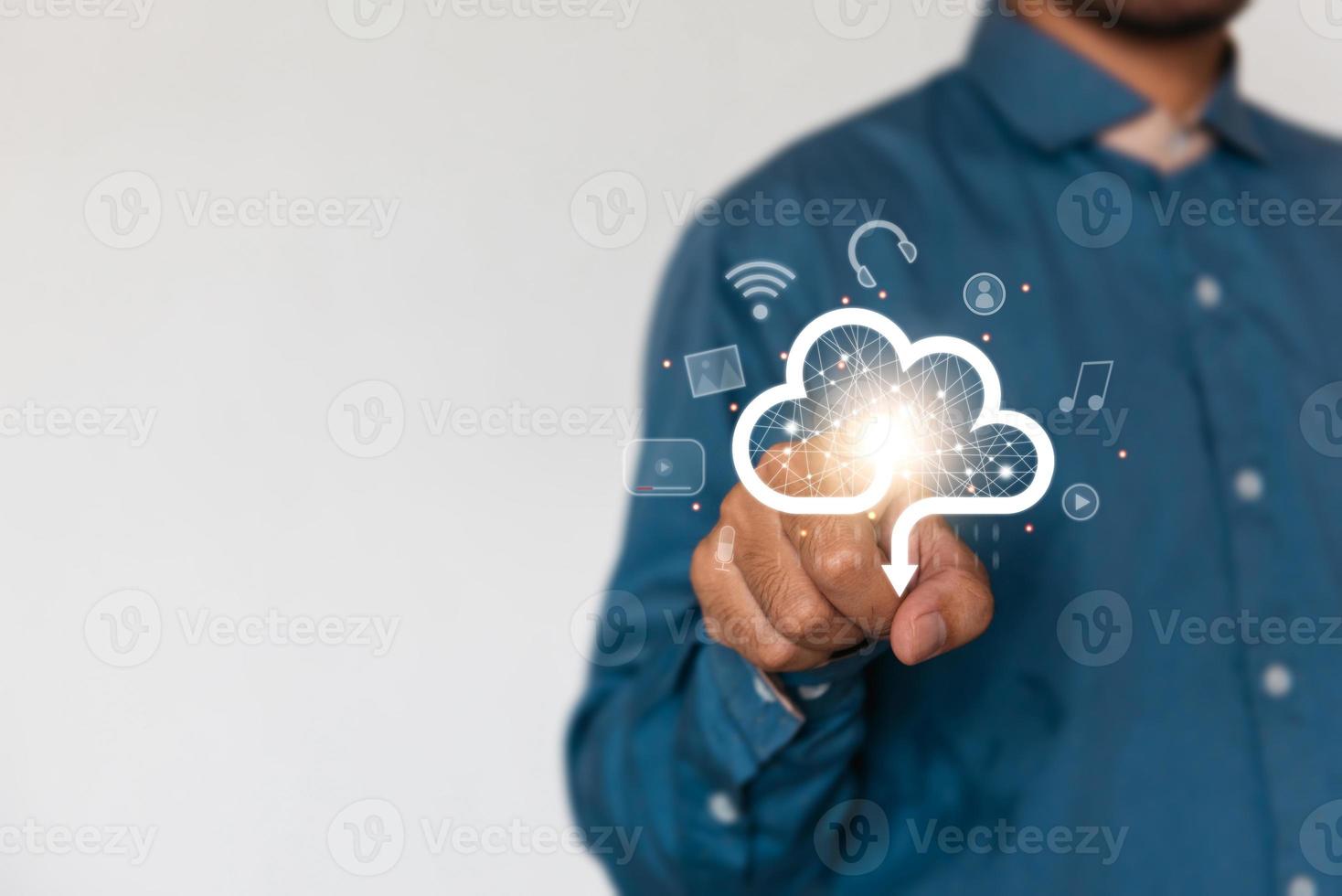 Businessman holding a cloud data icon with light. Computing data on network. Insurance Business computer security concept. photo