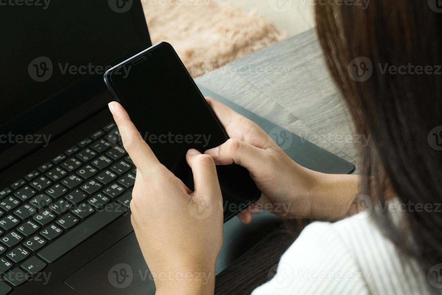 Cropped image of professional business woman working at home office via laptop, manager using portable computer device work process concept photo