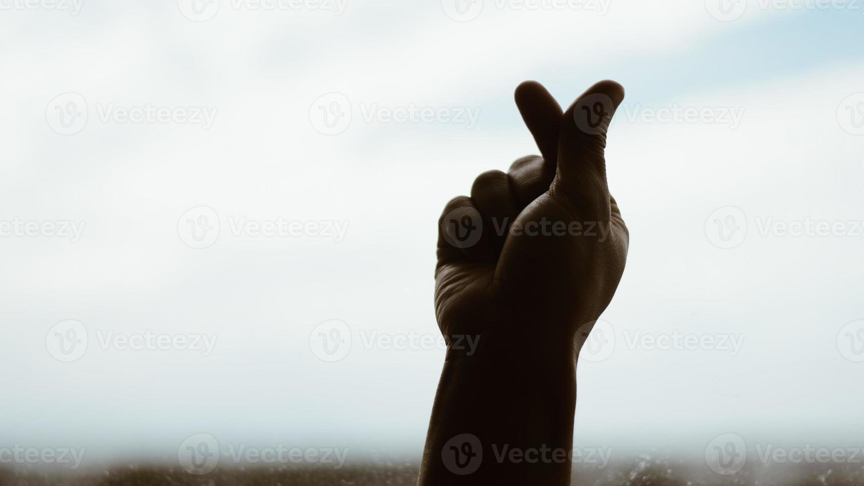 hands in the form of heart photo