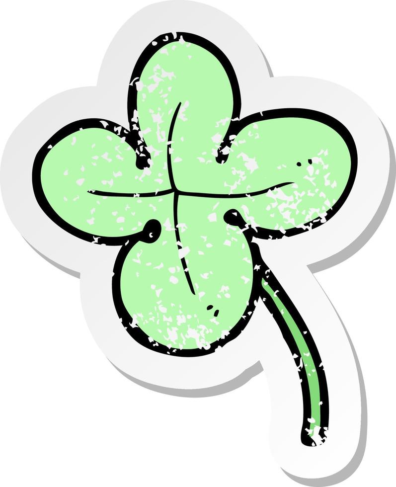 retro distressed sticker of a cartoon four leaf clover vector