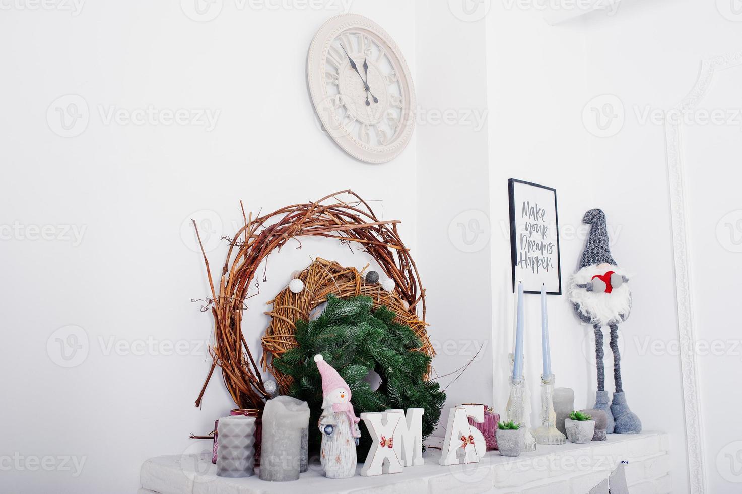 X-Mas word decor with wreath. Happy winter holidays concept. photo