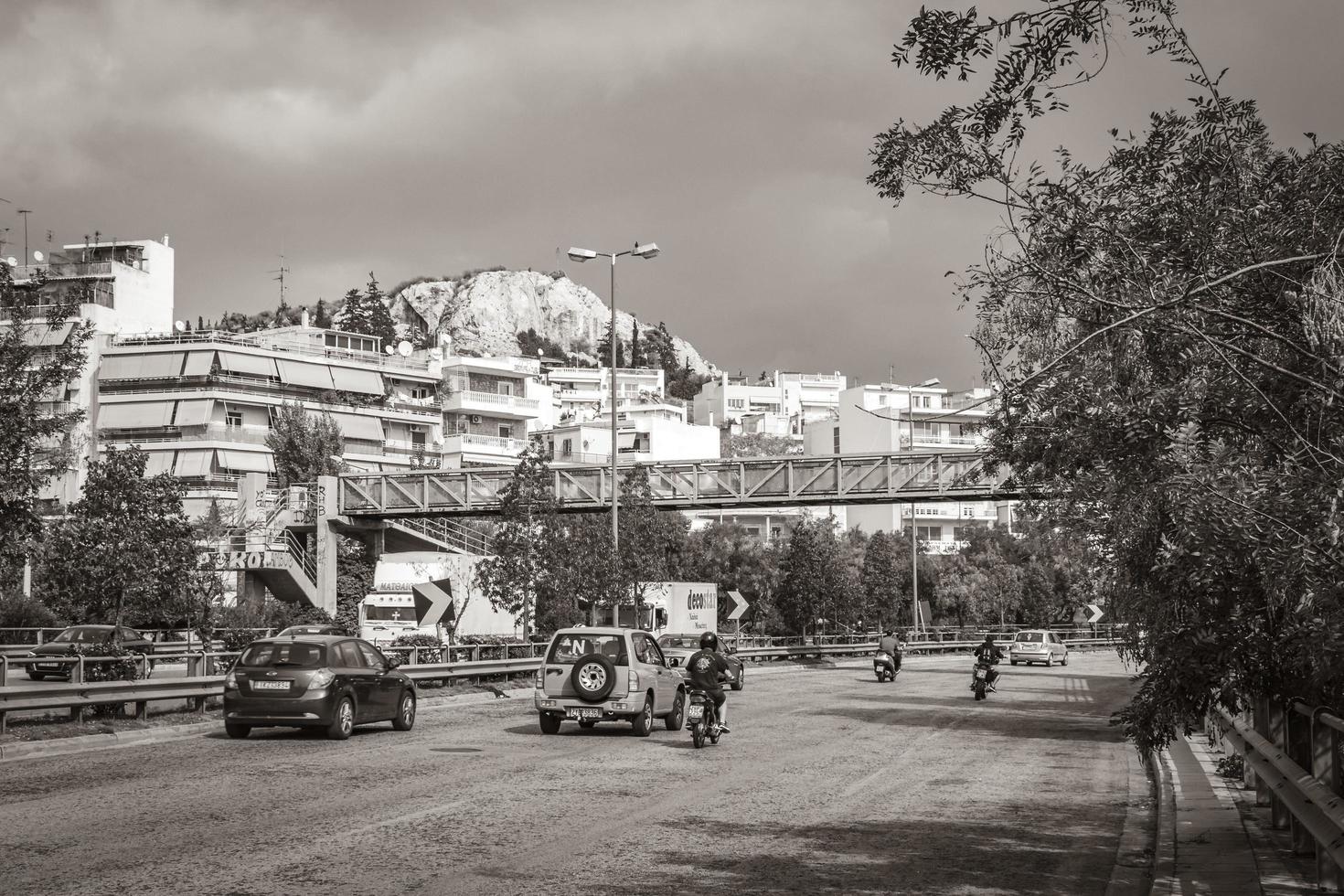 Athens Attica Greece 2018 Typical street road buildings cars in Greeces capital Athens Greece. photo