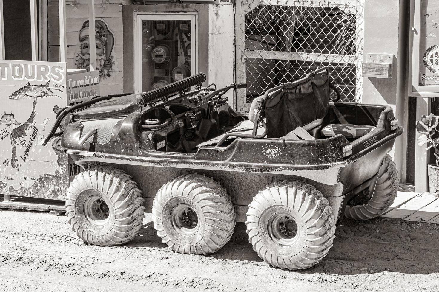 Holbox Quintana Roo Mexico 2021 Buggy golf cart 6 wheels muddy street village Holbox Mexico. photo