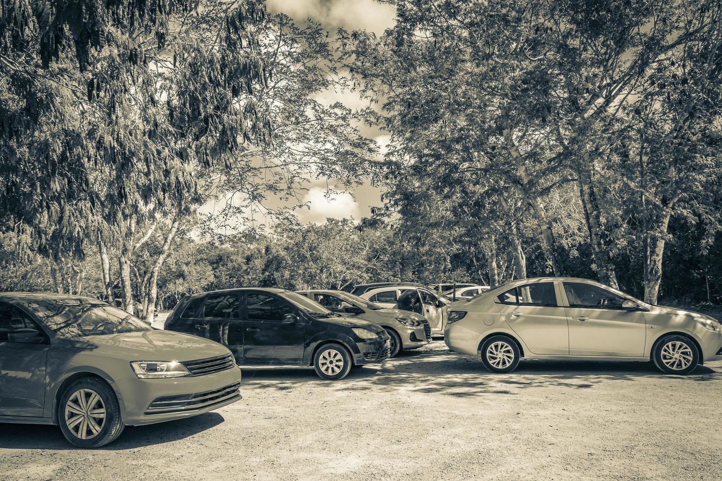 Tulum Quintana Roo Mexico 2022 Parking lot with cars jungle to Kaan Luum lagoon Mexico. photo
