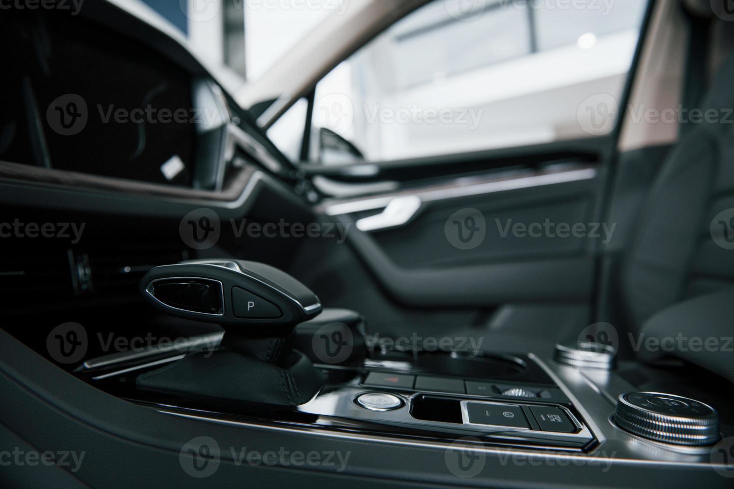 Black interior. Close up view of interior of brand new modern luxury automobile photo