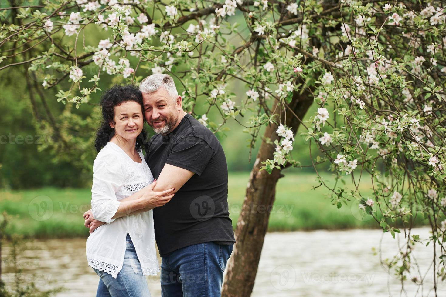 Cute people. Cheerful couple enjoying nice weekend outdoors. Good spring weather photo