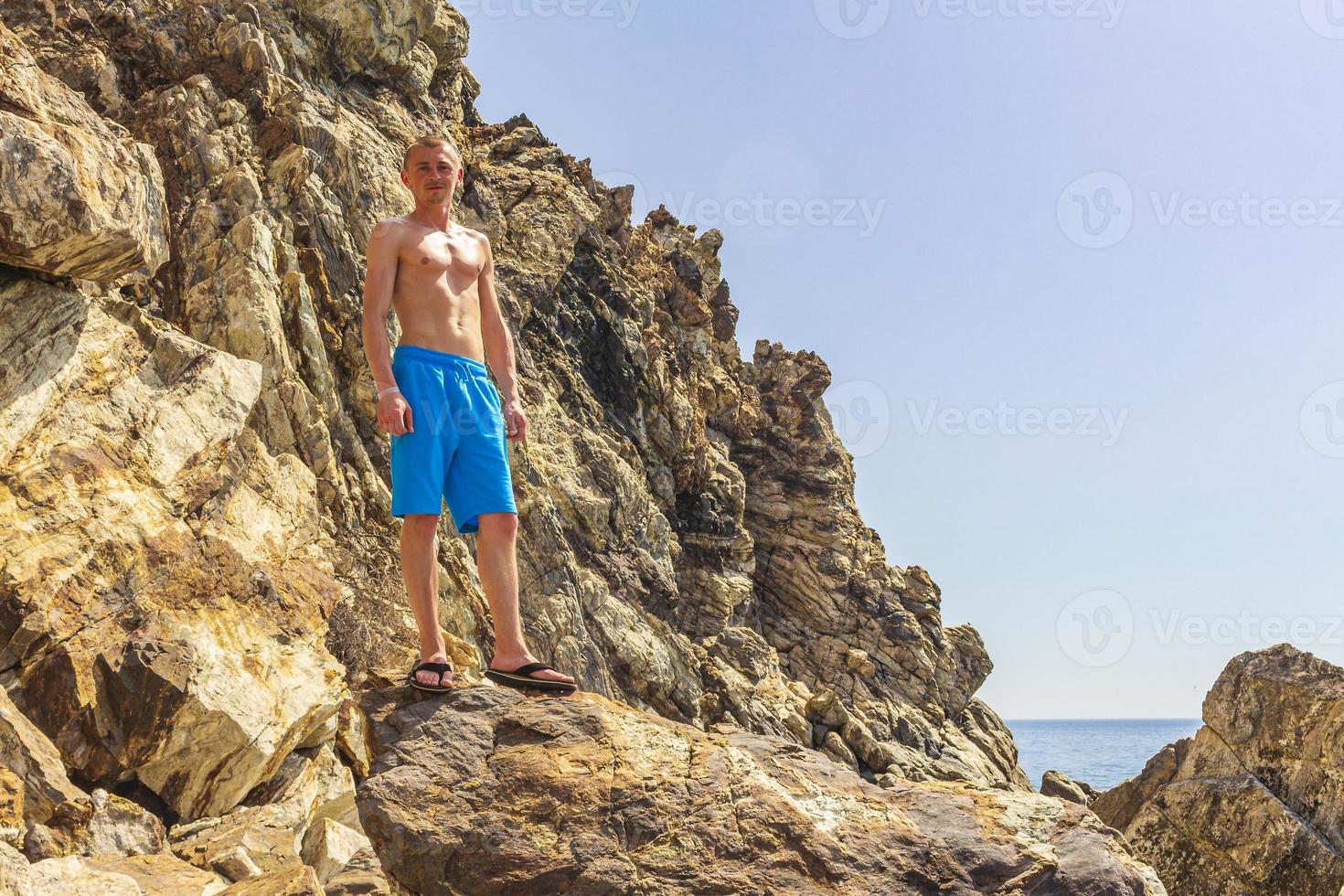 Young traveler hiker with natural coastal landscapes on Kos Greece. photo