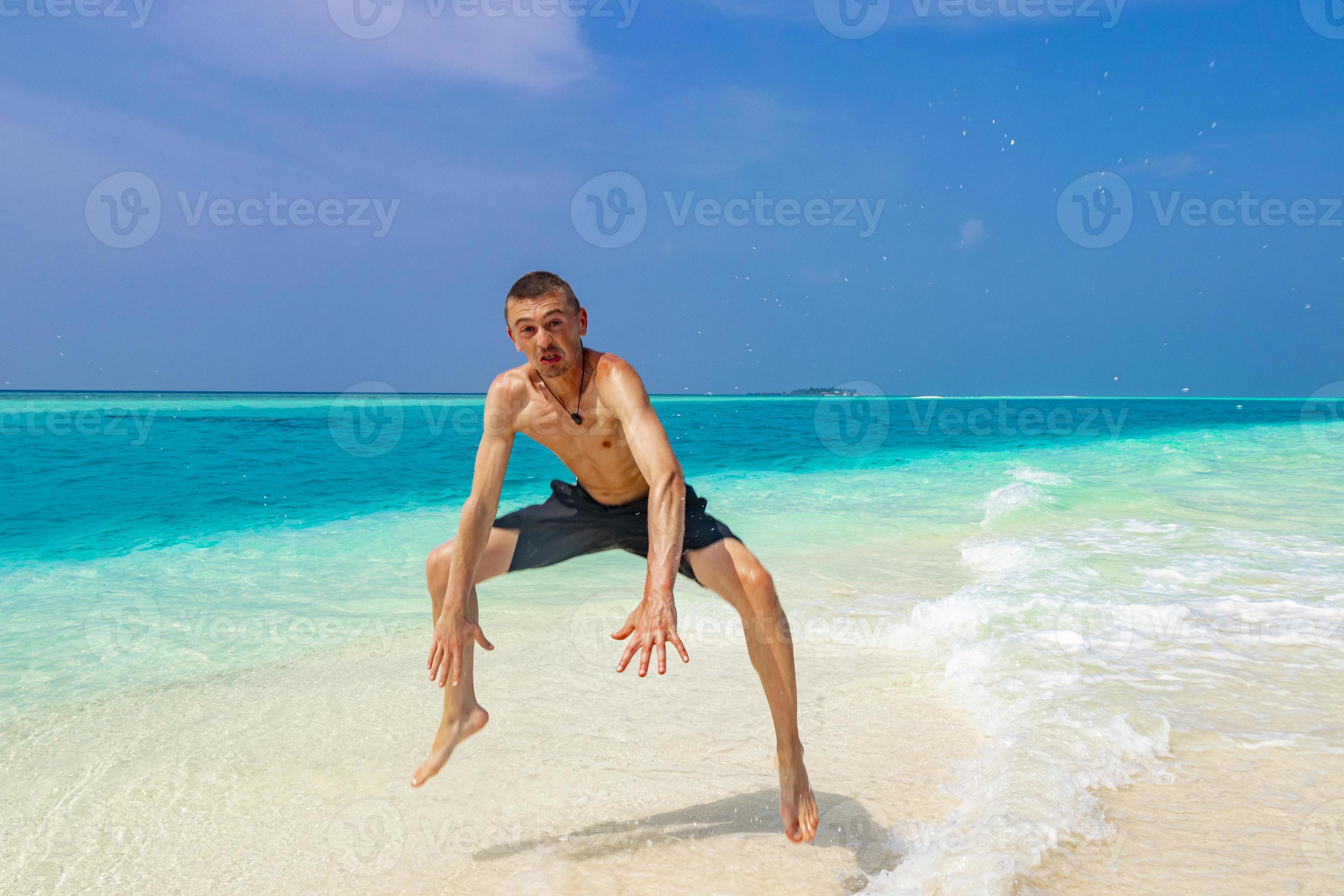 Funny tourist enjoys vacation on island Madivaru Finolhu Rasdhoo Maldives.  8683021 Stock Photo at Vecteezy