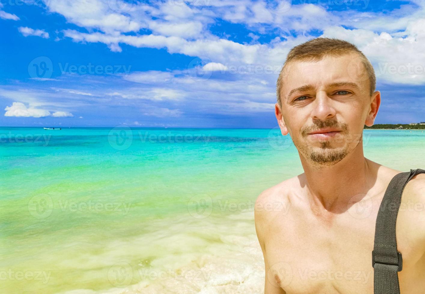 Male russian tourist traveler tropical beach Playa del Carmen Mexico. photo