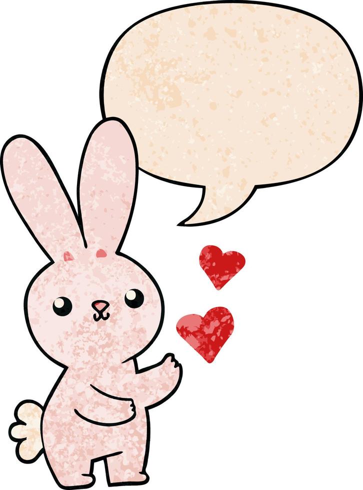 lindo conejo de dibujos animados y corazones de amor y burbuja de habla en estilo de textura retro vector