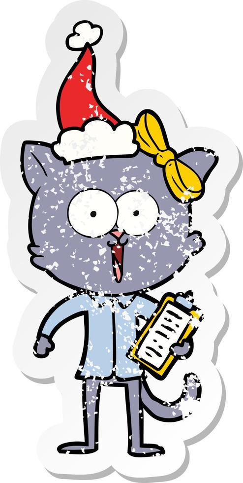 distressed sticker cartoon of a cat wearing santa hat vector