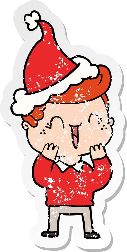 distressed sticker cartoon of a laughing boy wearing santa hat vector