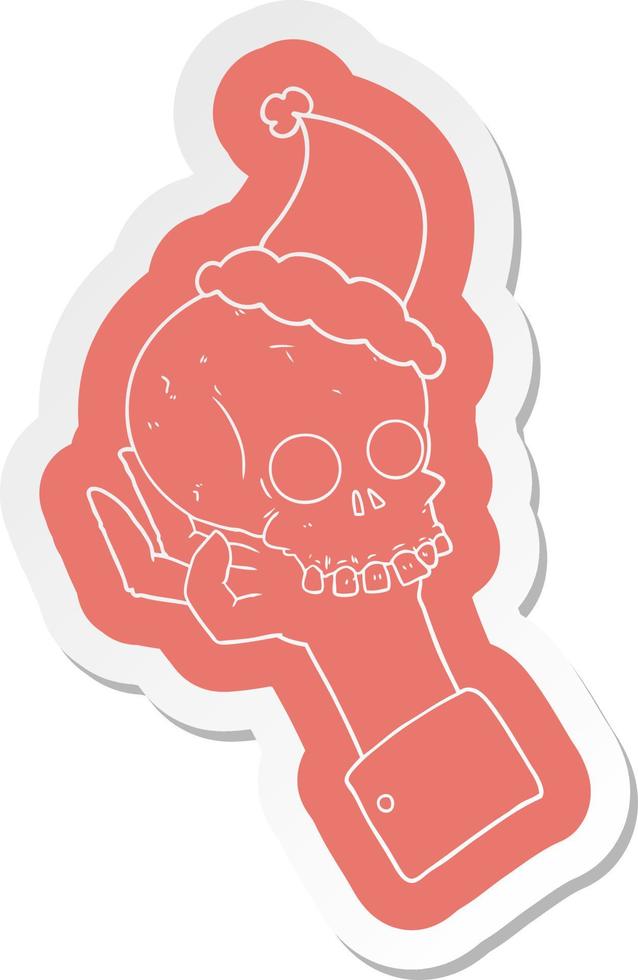 cartoon  sticker of a hand holding skull wearing santa hat vector