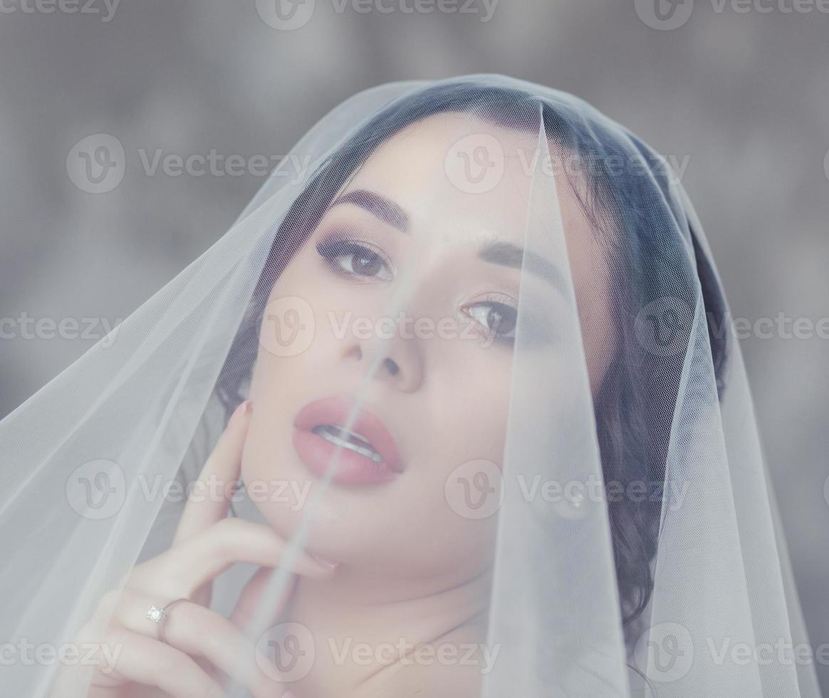 sensual bride with wedding makeup photo