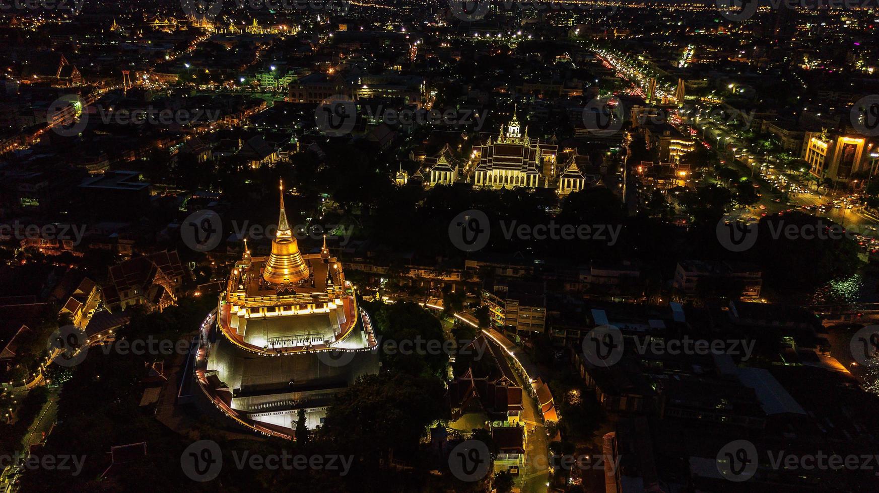 Golden Mountain  Wat Saket Ratcha Wora Maha Wihan popular Bangkok tourist attraction , Landmarks of bangkok Thailand . In the rain before , topview photo
