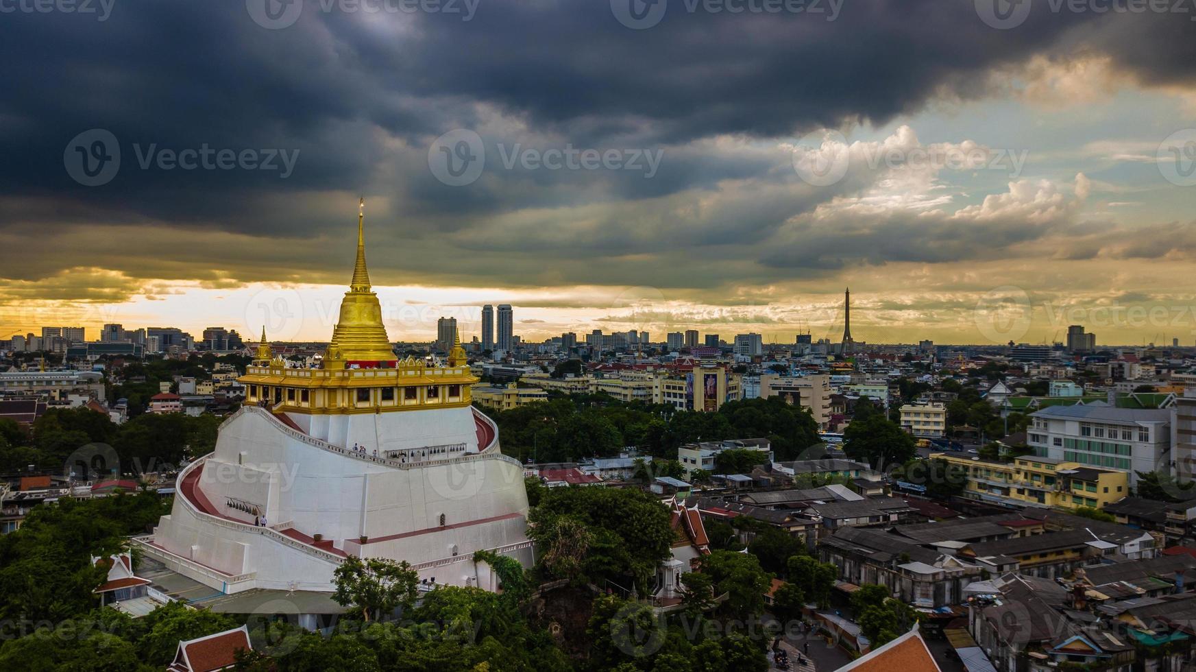 Golden Mountain  Wat Saket Ratcha Wora Maha Wihan popular Bangkok tourist attraction , Landmarks of bangkok Thailand . In the rain before , topview photo