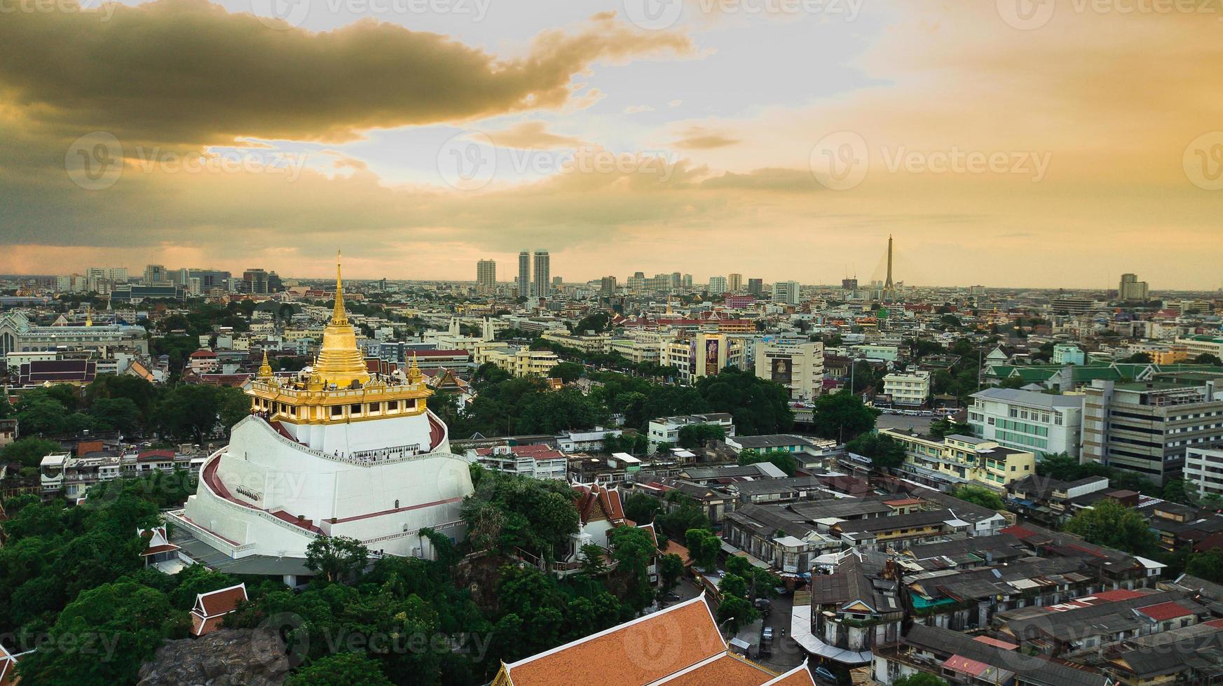 Golden Mountain  Wat Saket Ratcha Wora Maha Wihan popular Bangkok tourist attraction , Landmarks of bangkok Thailand . In the rain before , topview photo
