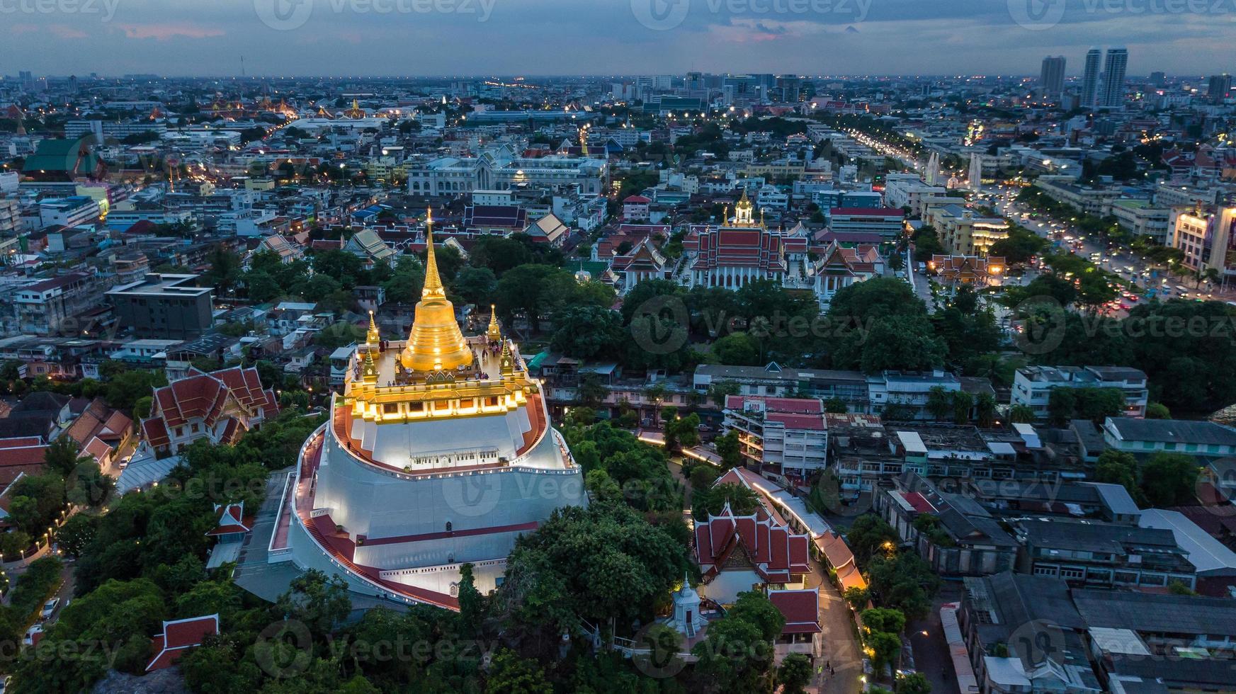 Golden Mountain  Wat Saket Ratcha Wora Maha Wihan popular Bangkok tourist attraction , Landmarks of bangkok Thailand . In the rain before , topview photo