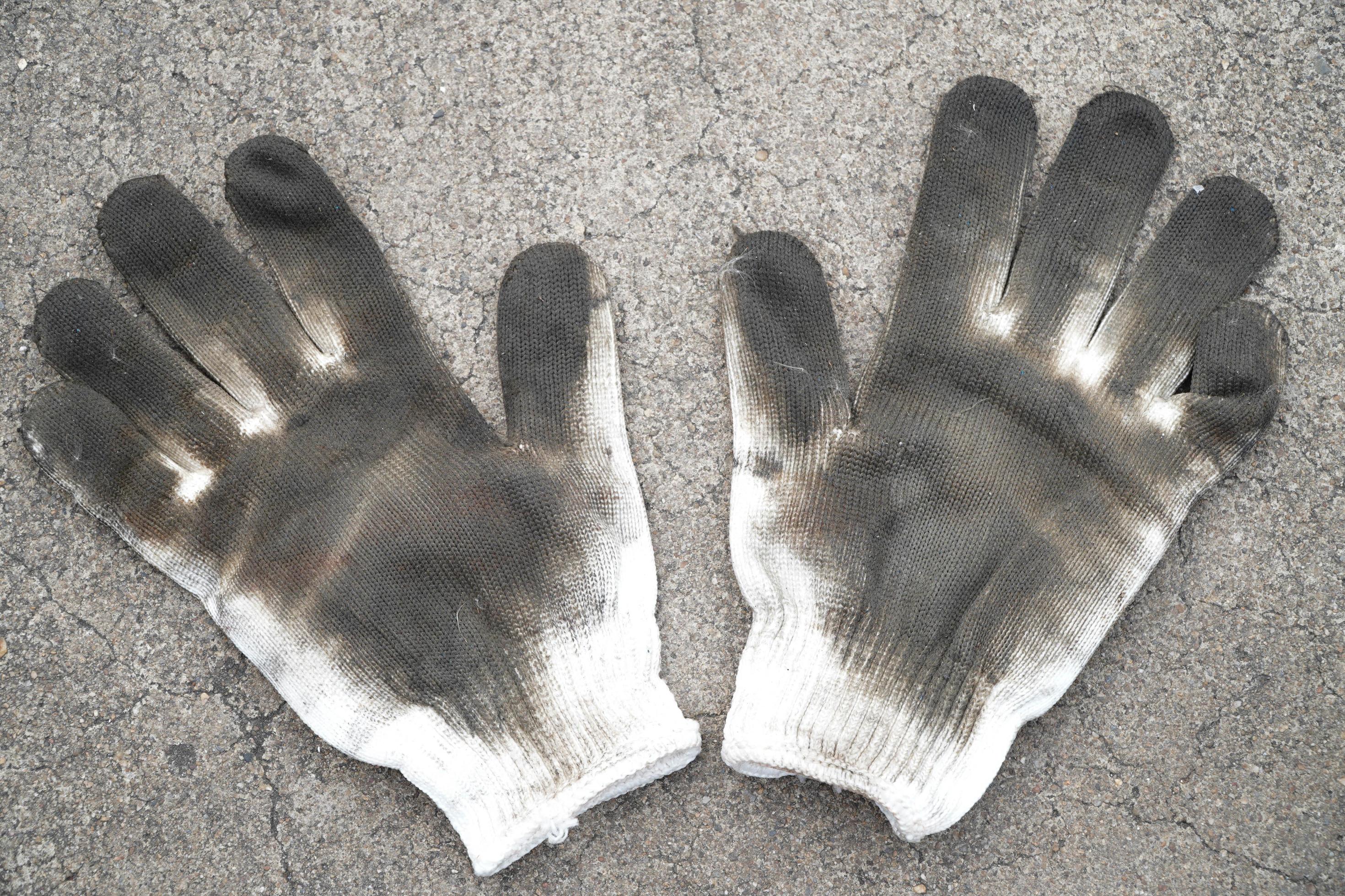 Engineering dirty white cloth gloves 8700790 Stock Photo at