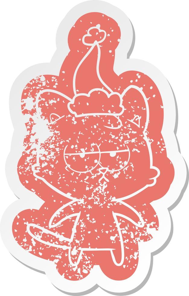 bored cartoon distressed sticker of a cat wearing santa hat vector
