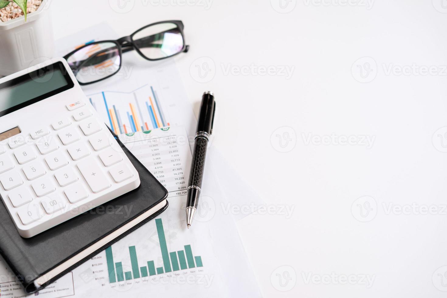 Desk office business financial accounting calculate with copy space photo