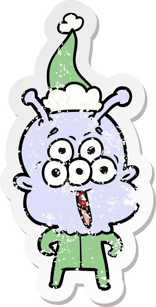 happy distressed sticker cartoon of a alien wearing santa hat vector
