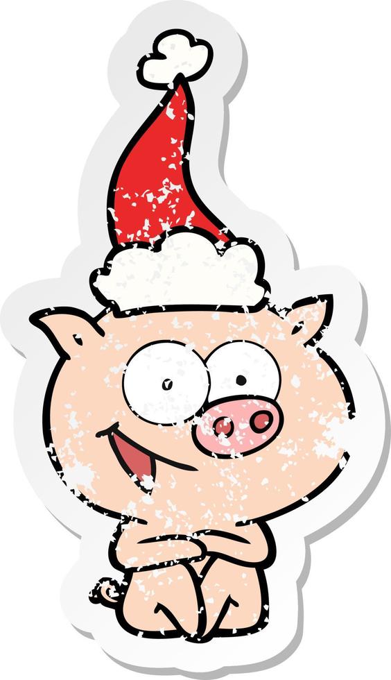 cheerful sitting pig distressed sticker cartoon of a wearing santa hat vector